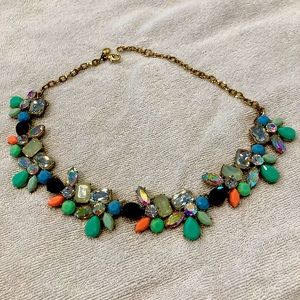 J. Crew statement necklace with teal, blue, salmon, and iridescent gems.